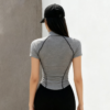 Haut de Sport Demi-Zippé Extérieur