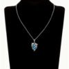 Collier "Étreinte du Dauphin" en Saphir Synthétique Bleu – Pendentif Animal Romantique et Élégant