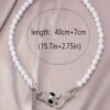 Rectangle 865 (2) Collier Élégant Tête de Serpent et Perle – Bijou Unique et Chic pour Femme
