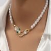 Rectangle 866 (1) Collier Élégant Tête de Serpent et Perle – Bijou Unique et Chic pour Femme