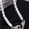 Rectangle 867 (1) Collier Élégant Tête de Serpent et Perle – Bijou Unique et Chic pour Femme