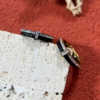 1. Nom du produit Bague Double Anneau en Acier Inoxydable et Céramique – Alliance Moderne et Graphique