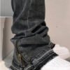Jean Denim Noir Slim Fit 2026 – Coupe Ajustée Extensible avec Fermetures Éclair aux Chevilles et Finitions Haut de Gamme
