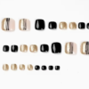 24 ongles d'orteils courts carrés noirs et dorés à paillettes avec accents rayés et finition brillante